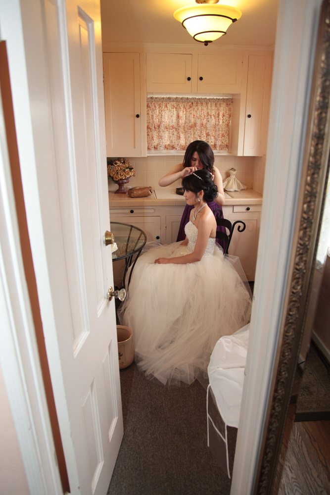 Bride getting ready before wedding ceremony