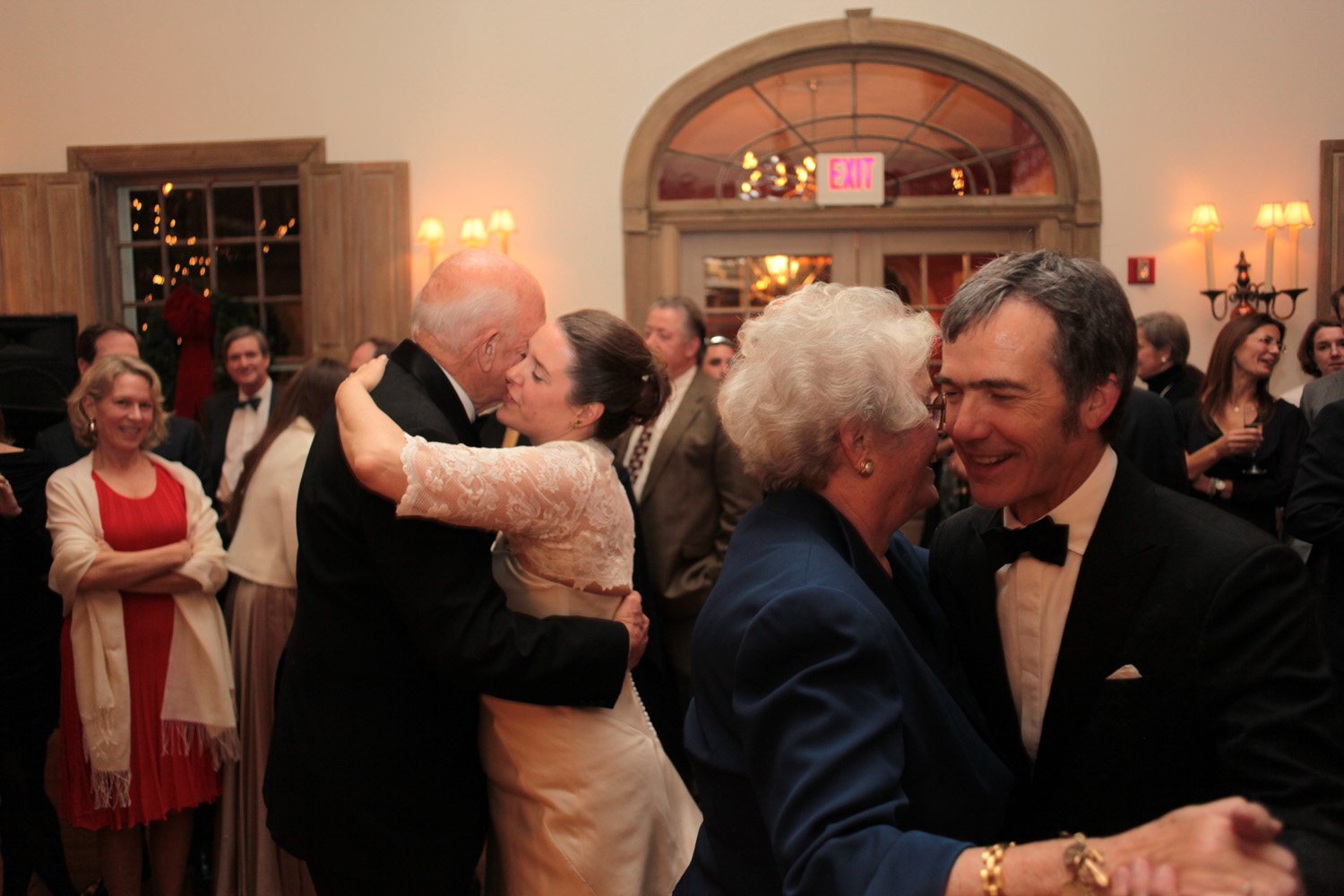Rabbi blessing bride and groom during wedding ceremony