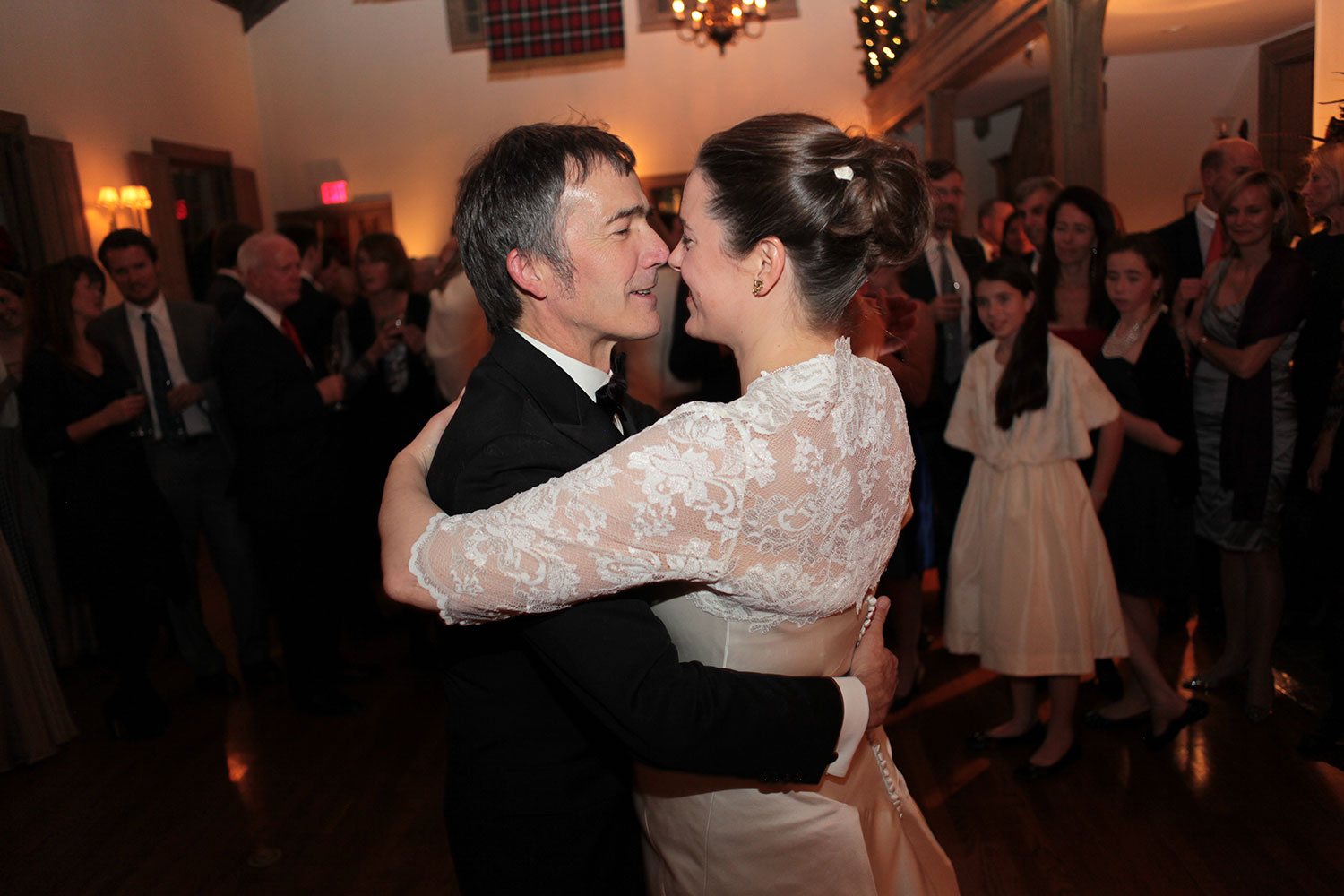 Bride and groom dancing during reception